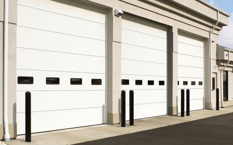 Overhead garage doors on commercial property.